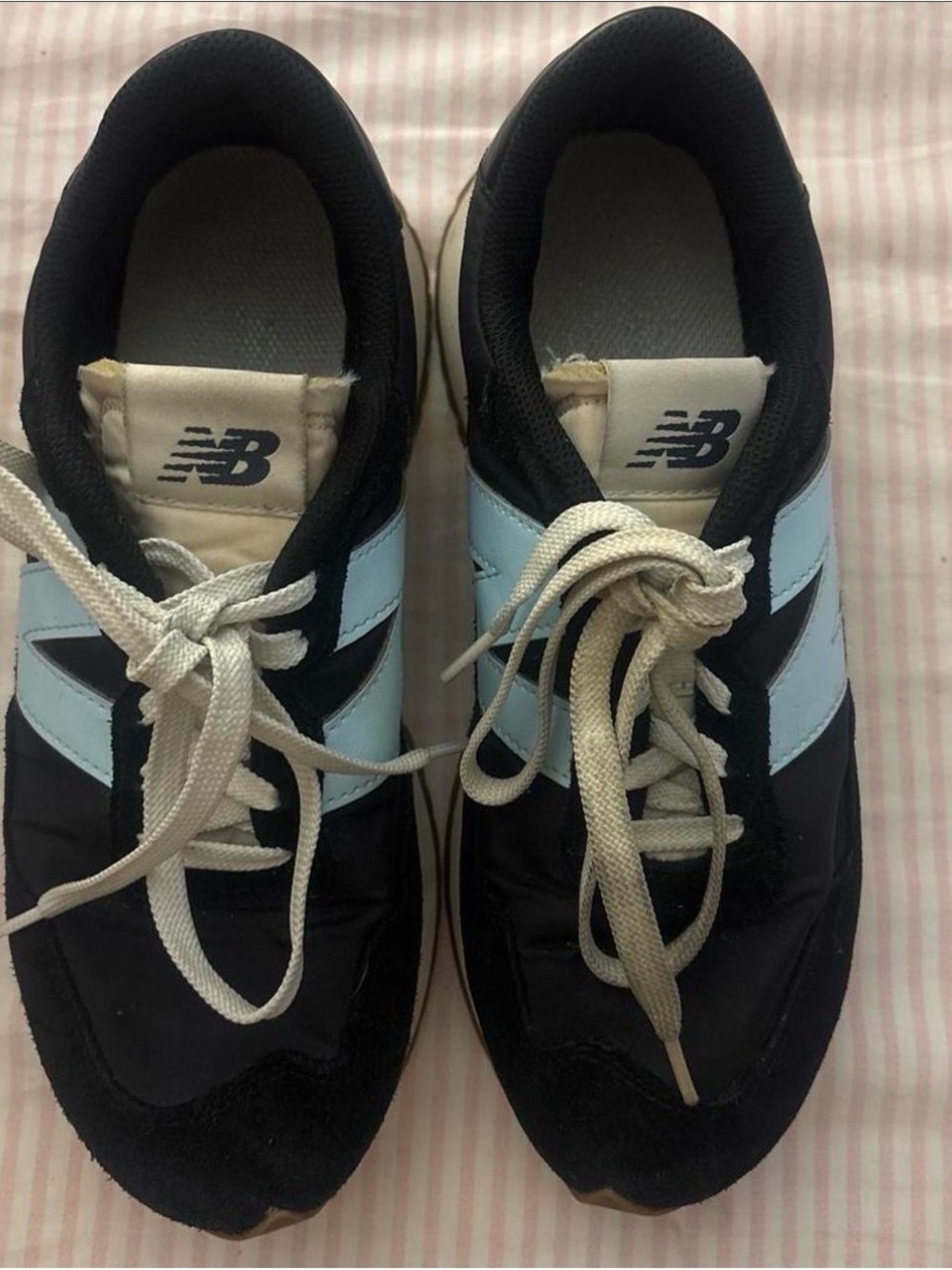 New Balance 237. Has stains but can be cleaned!